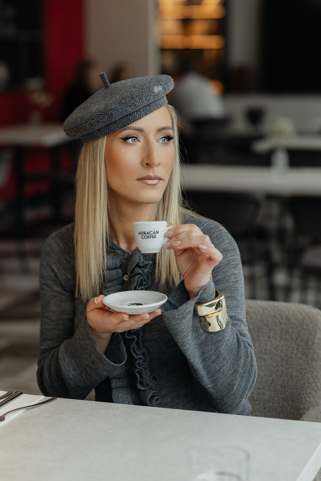 Grey knit with ruffle detail