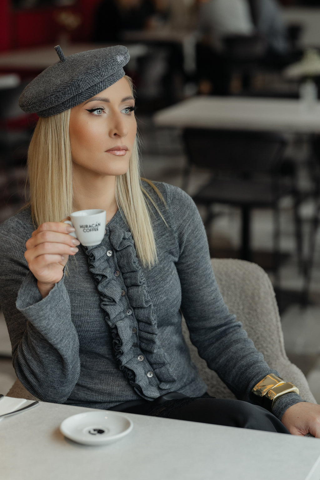 Grey knit with ruffle detail