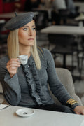 Grey knit with ruffle detail